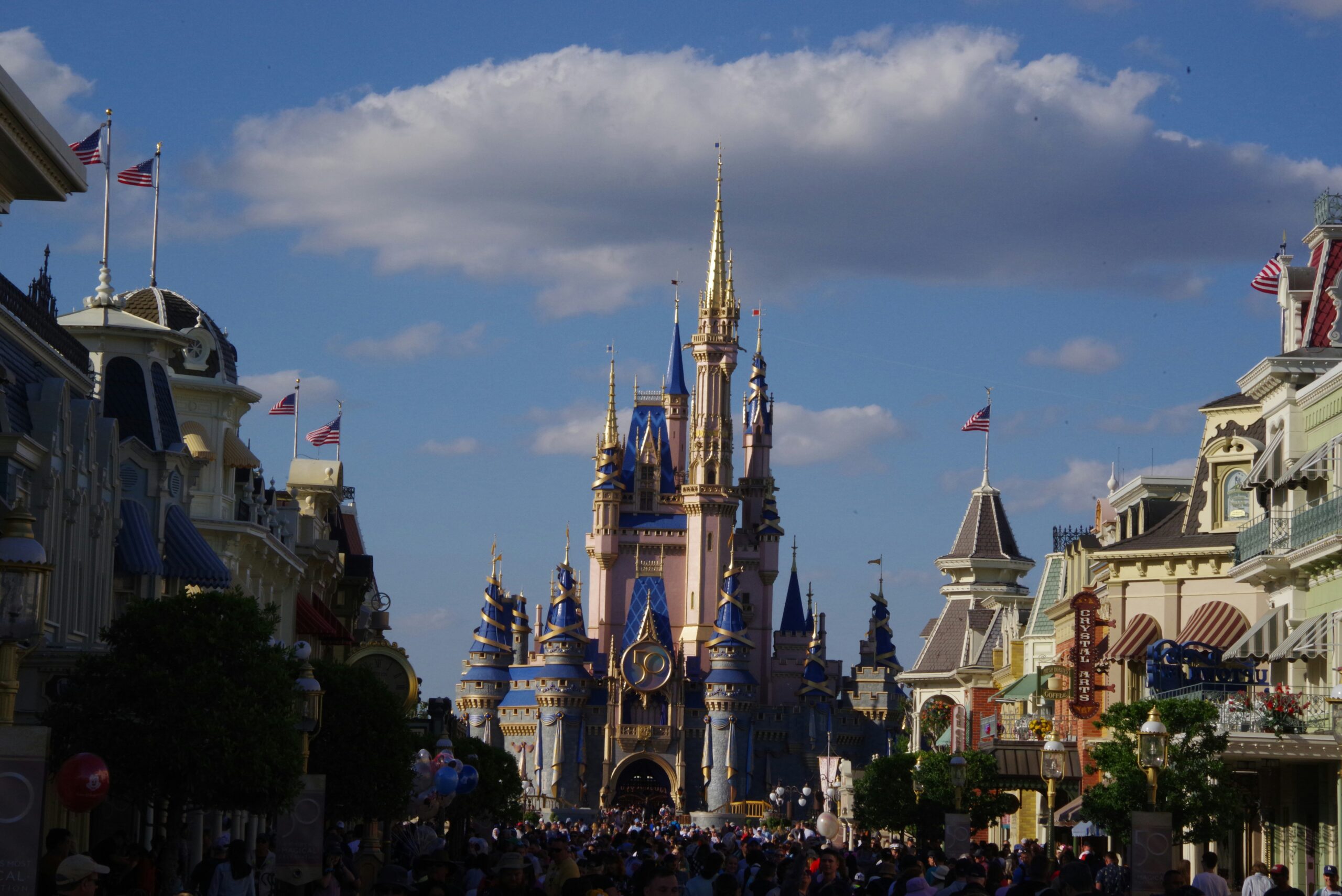 Cinderella Castle above the Main Street crowds, Magic Kingdom