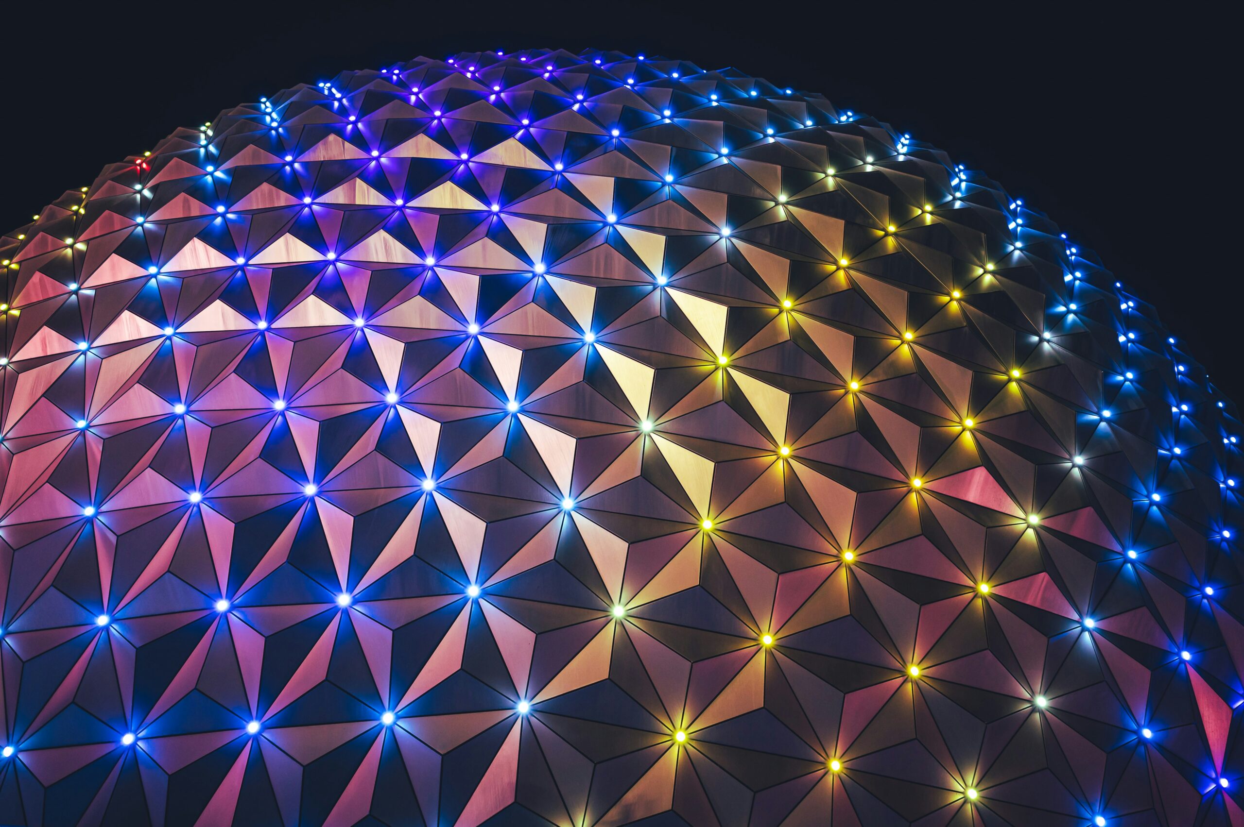 Spaceship Earth with its night-time light display, EPCOT