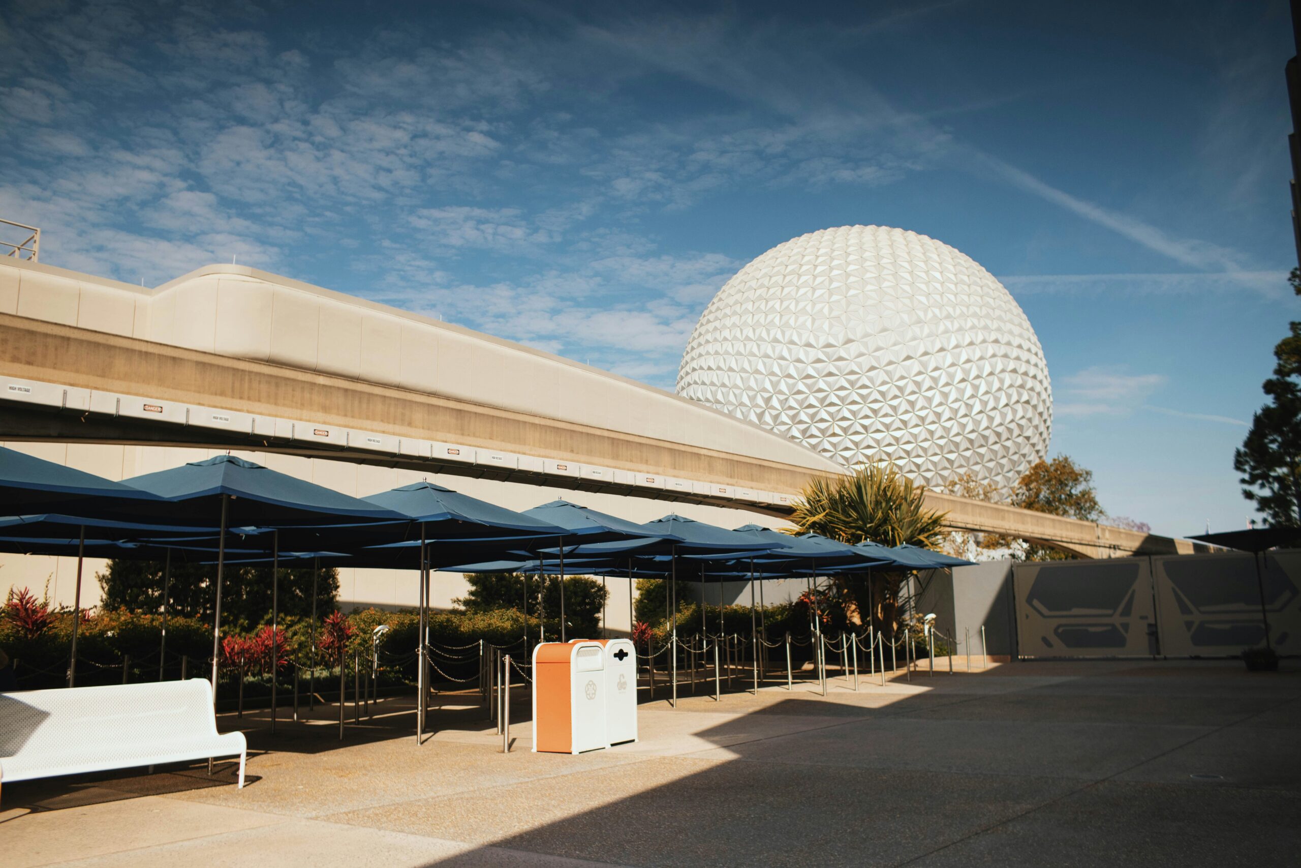Spaceship Earth behind the entrance canopies at EPCOT