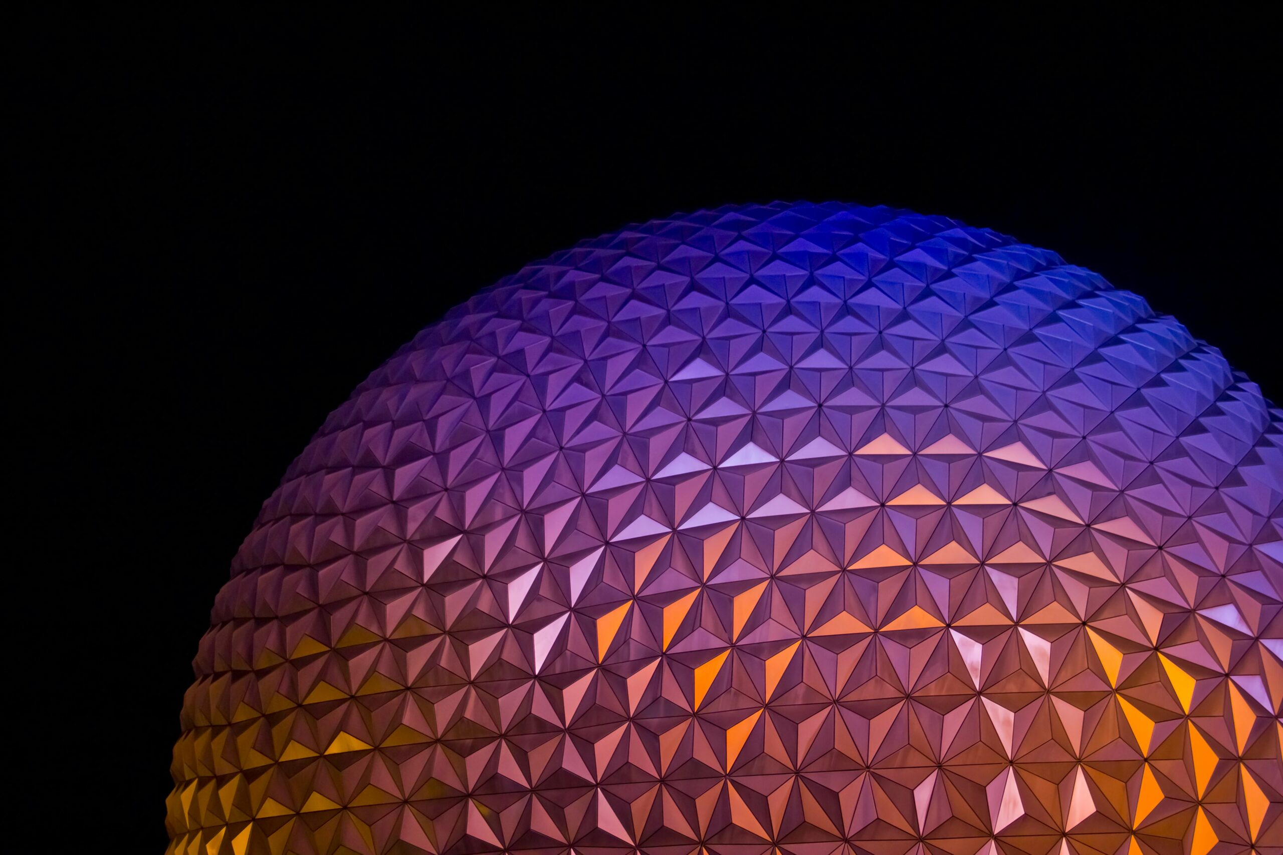 Spaceship Earth geodesic sphere lit purple, EPCOT