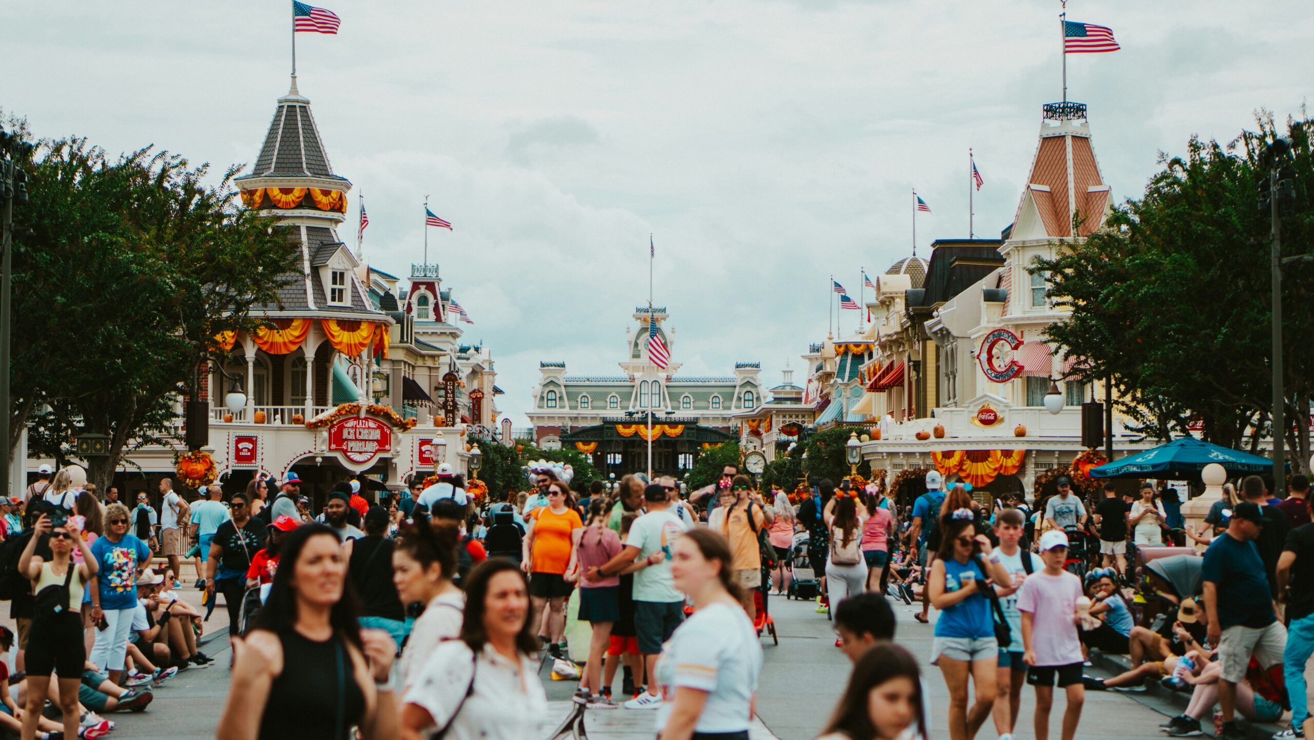 Crowds on Main Street U.S.A. with autumn decorations, Magic Kingdom